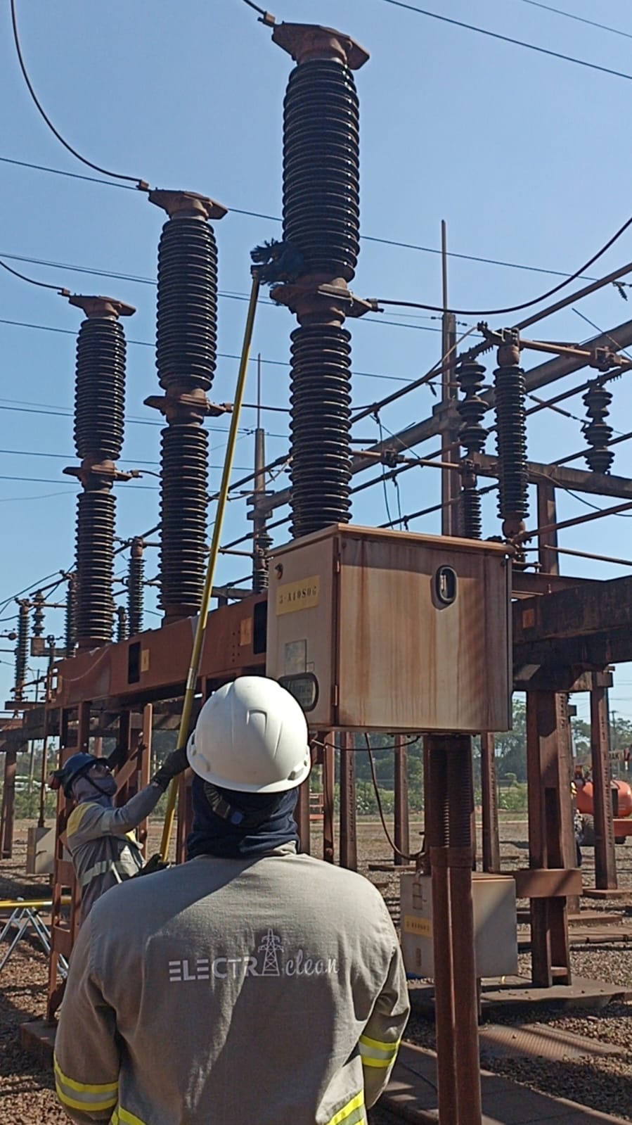 LiveCleaning team cleaning insulators on a live substation